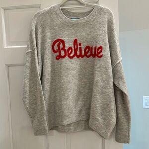 Believe sweater